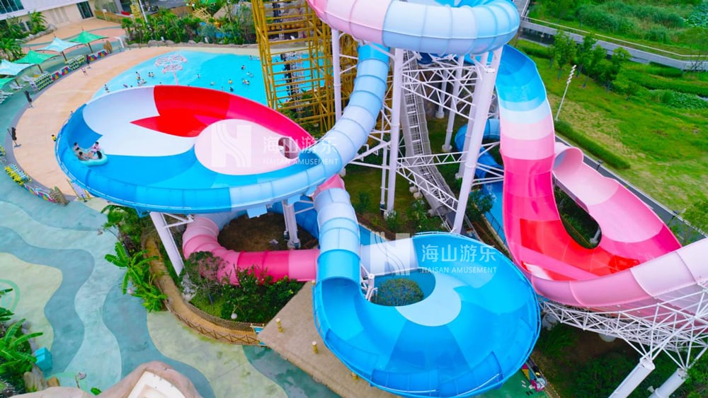 双重风暴，极致竞速——星际盘旋+巨浪翻滚组合引爆水乐园刺激体验
